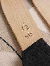 Close-up of the name engraving on the wooden drySki Exclusive kids' ski